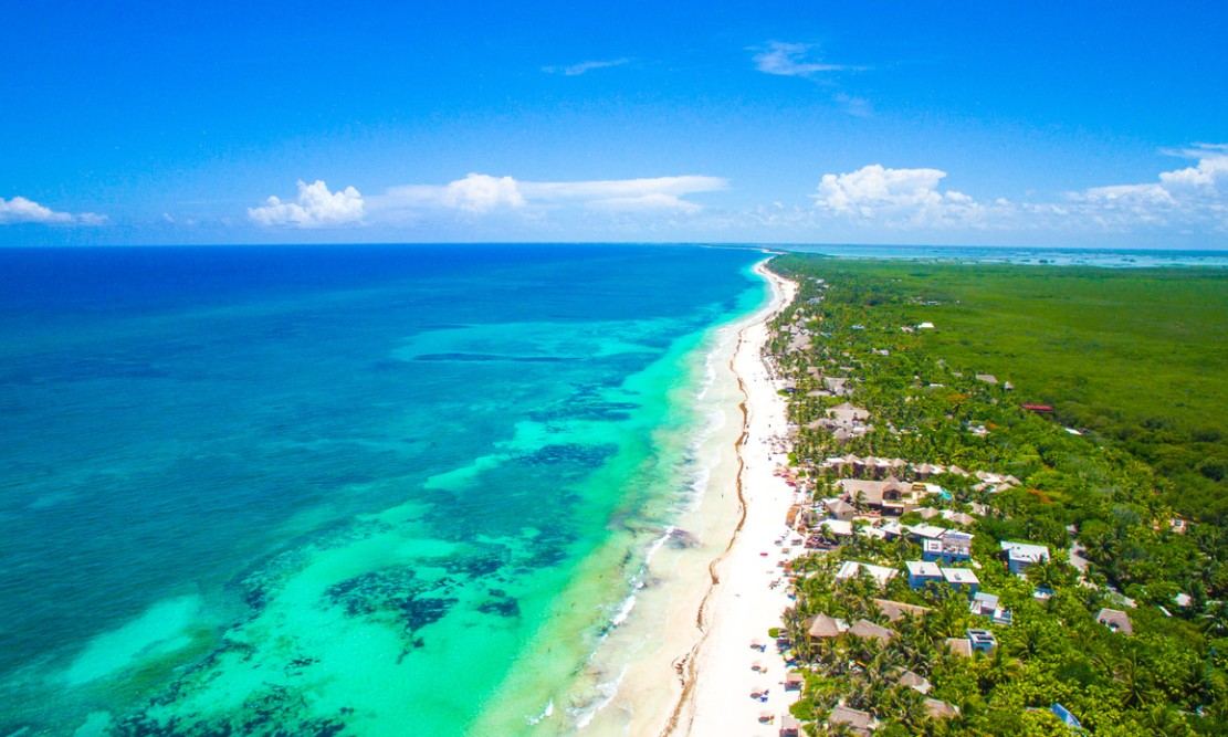 Private boat tour in Tulum Mexico on turquoise Caribbean water