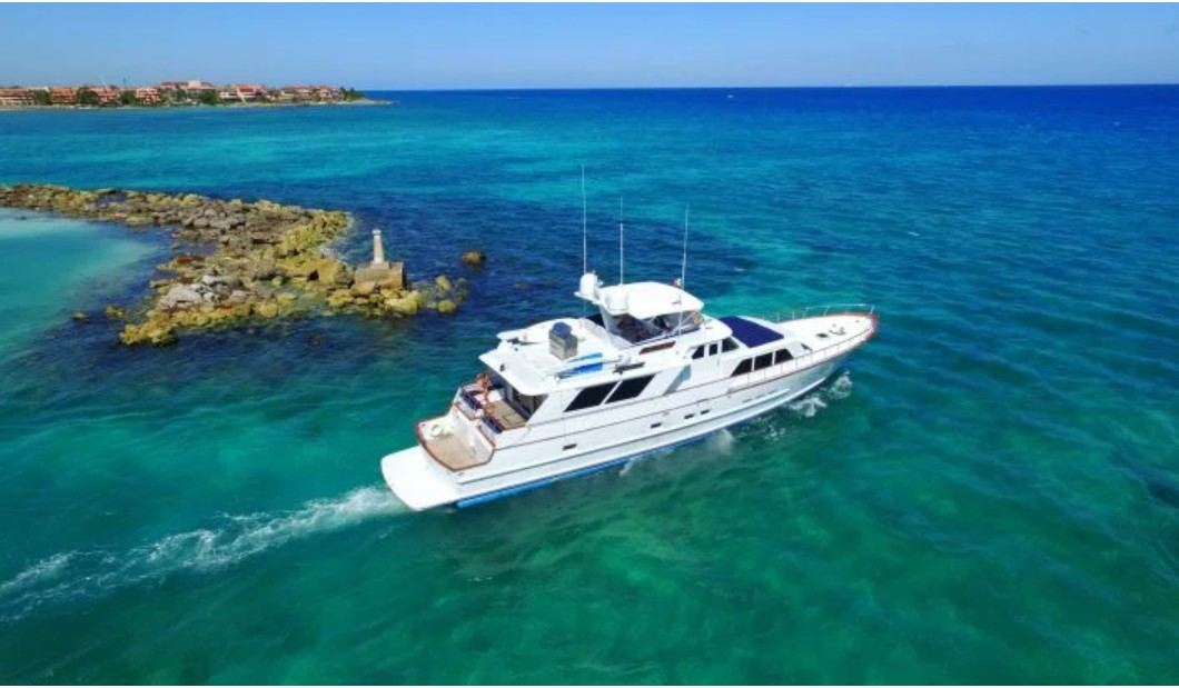 Private yacht rental in Tulum Mexico with turquoise Caribbean water