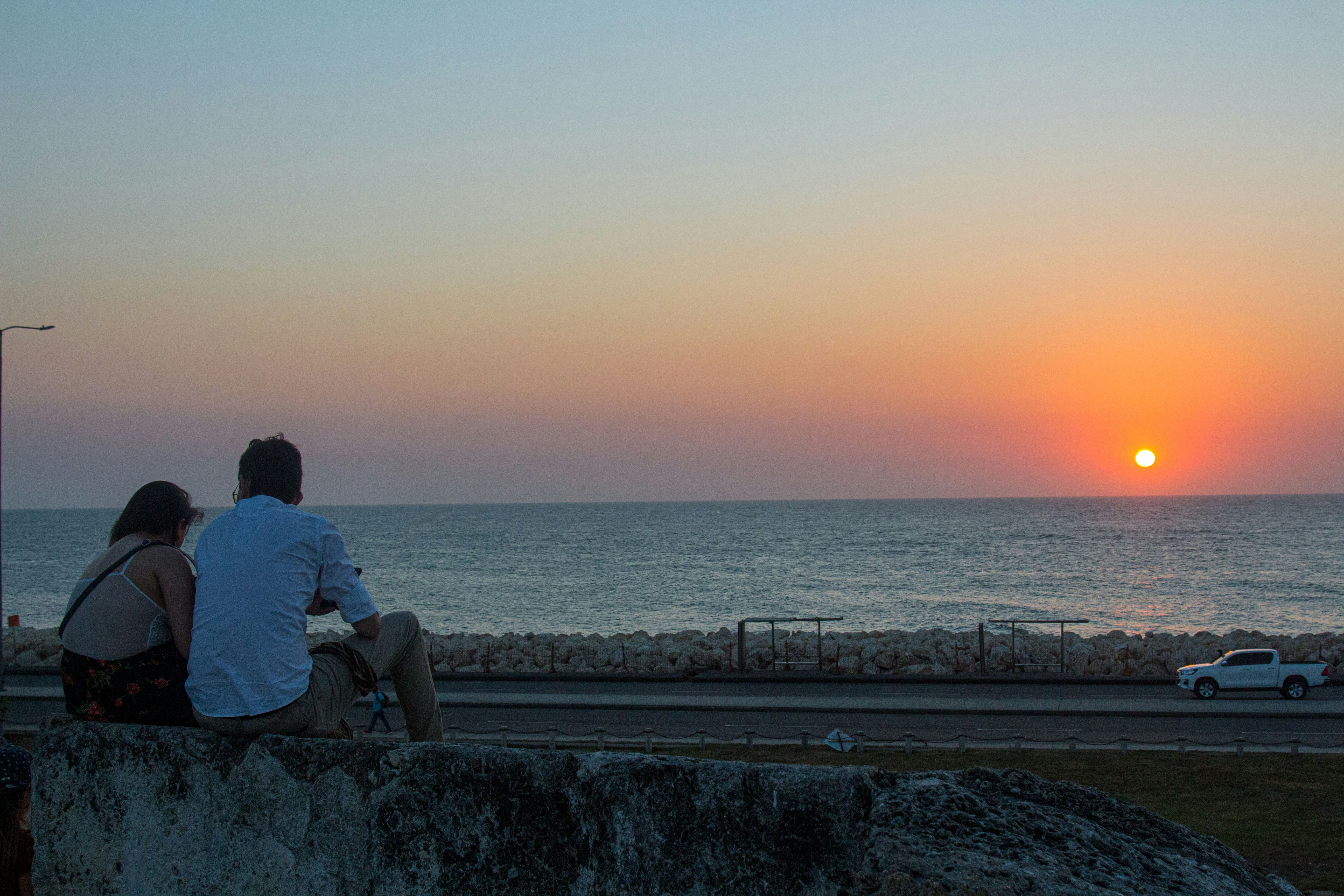 Romantic sunset cruise over Cartagena Bay with the walled city in the background